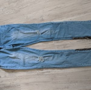 Men's ripped knee skinny jeans with zippee ankles